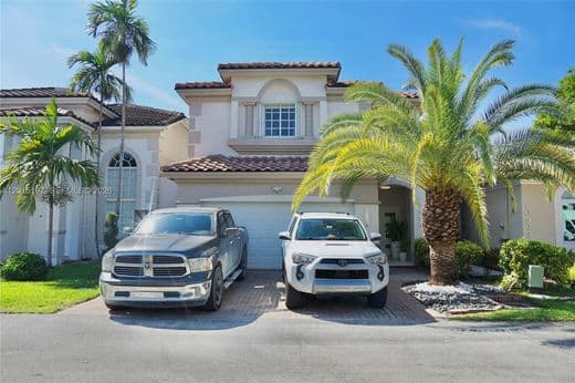 South Florida home framed by palm trees